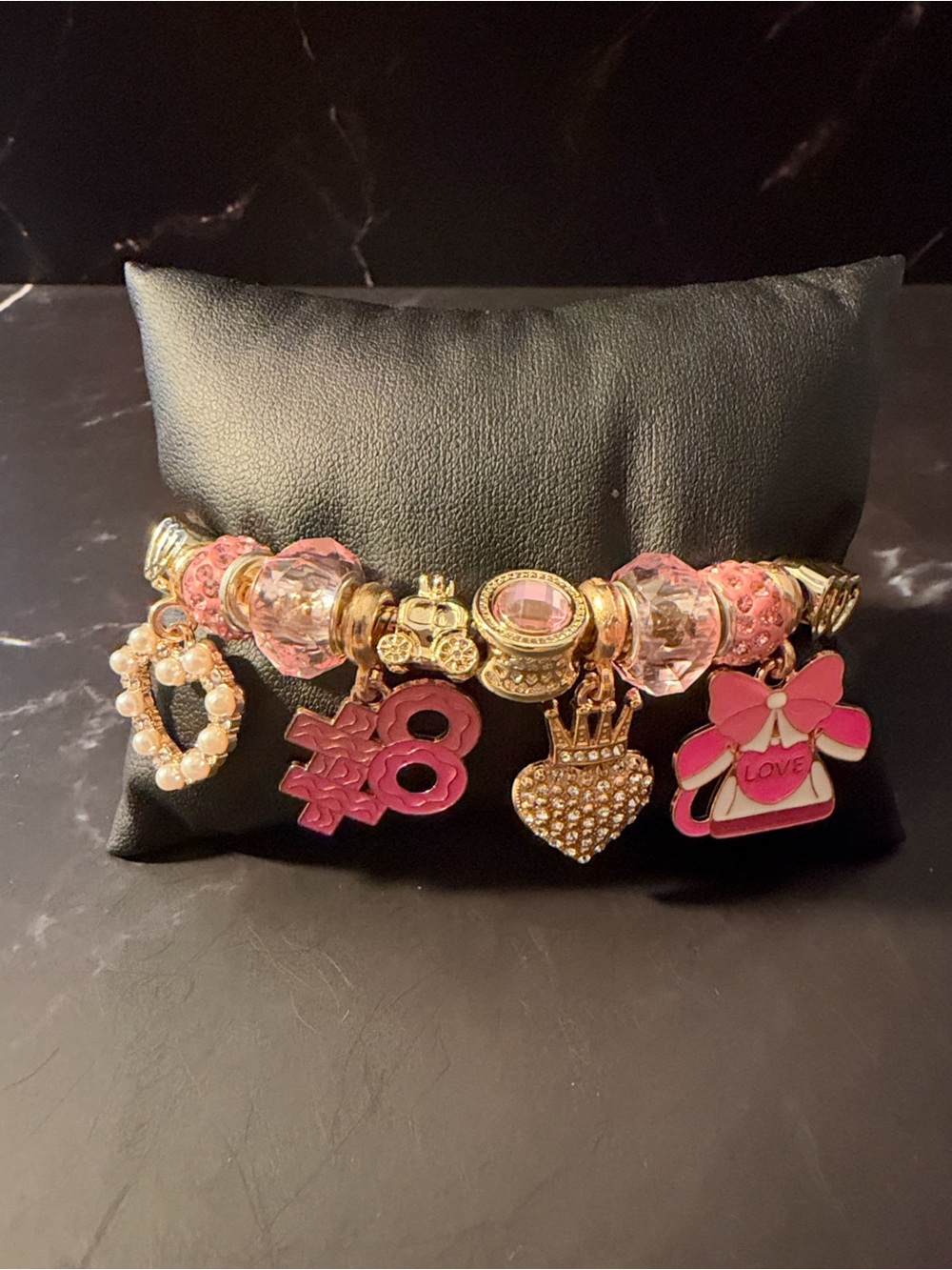 Gold Tone Pink Charm Bracelet with Love, Crown, and Number 8 Charms Stainless S